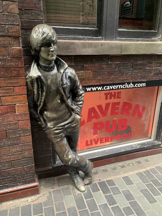 Statue of John Lennon outside the club.